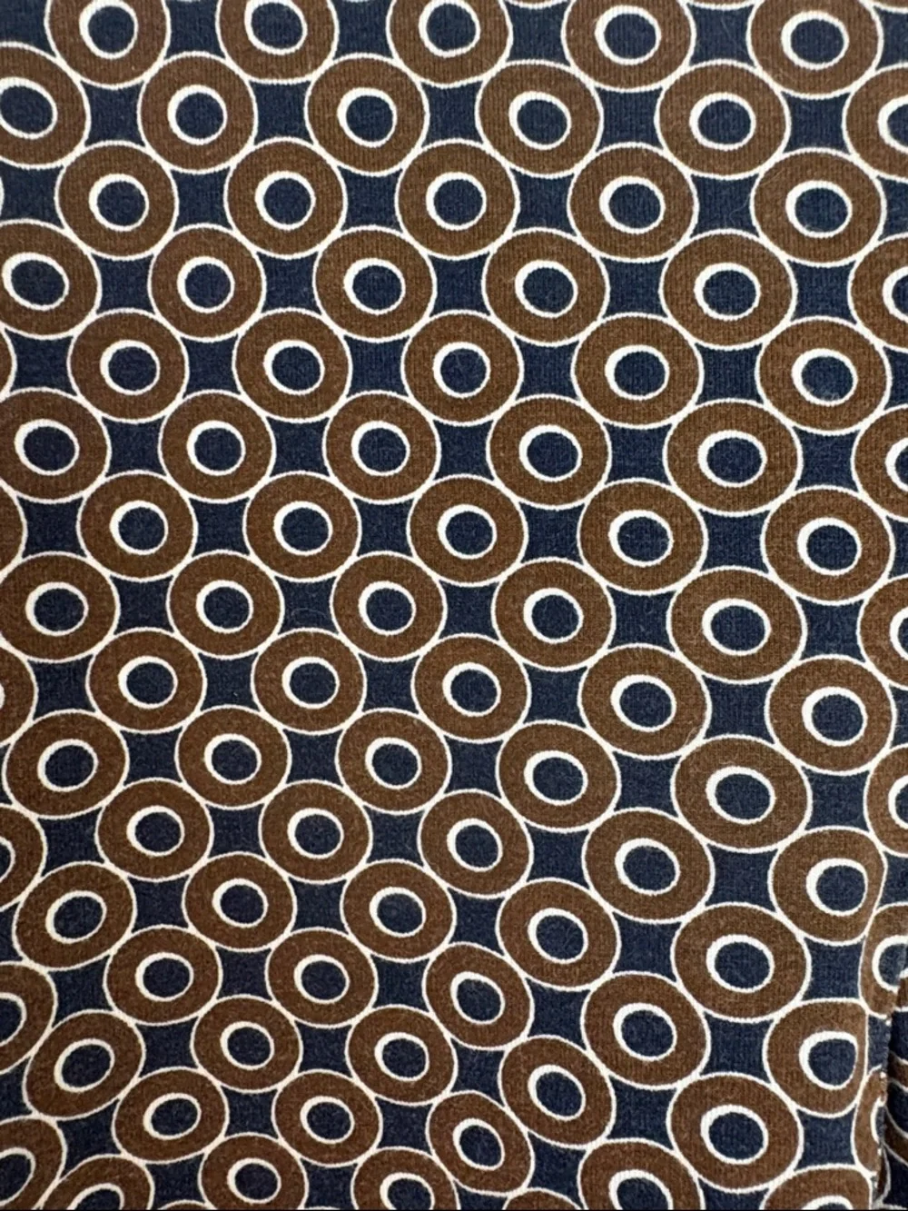Boden jersey skirt with a brown and blue patterned design 12R
